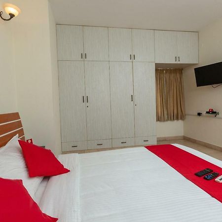 Oyo 23202 Cute Orange Service Apartments Ченнаи Экстерьер фото